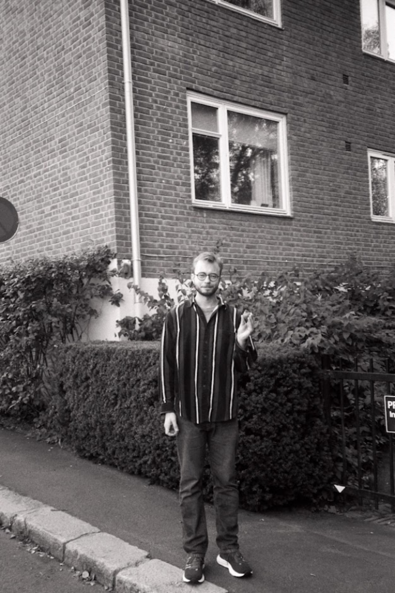 Tobias holding a pear